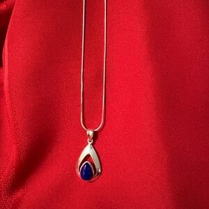 Sleek Silver Necklace with Deep Blue Pendant